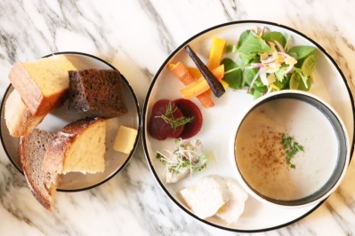 Clam chowder meal and assortment of breads
